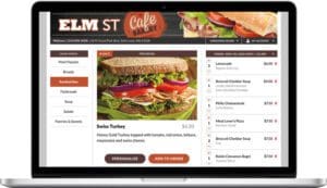 A restaurant's online menu is shown on the screen of a laptop.