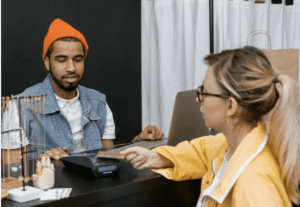 customer shopping at boutique using credit card POS system