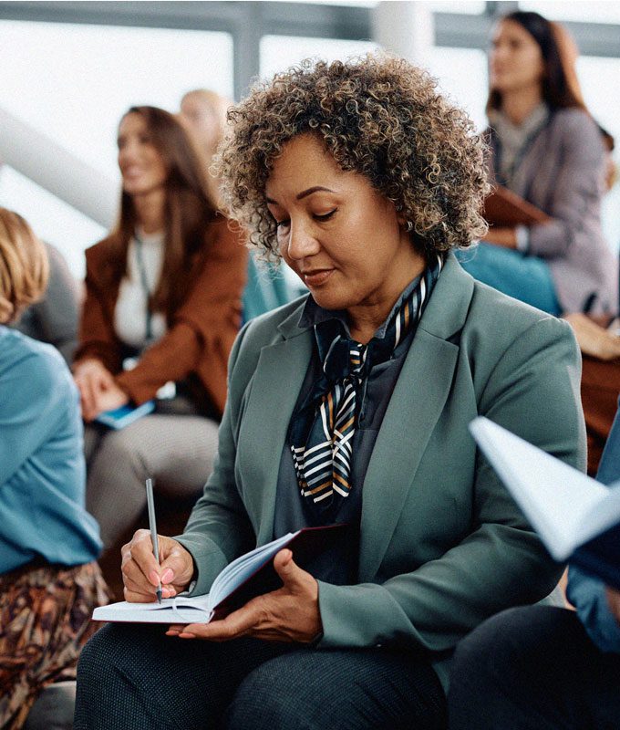 Professional woman taking notes