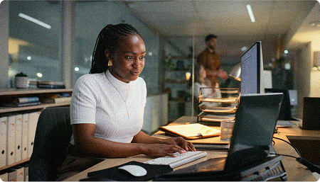 Woman working on computer in an office