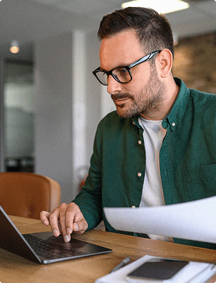 Man working on laptop at a desk