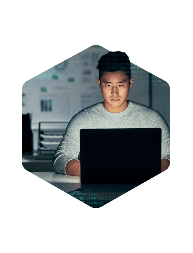 Man working on laptop at a desk